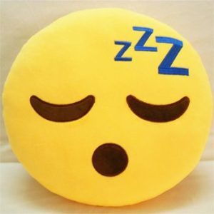 Cuscino tondo giallo con emoticon dormiente