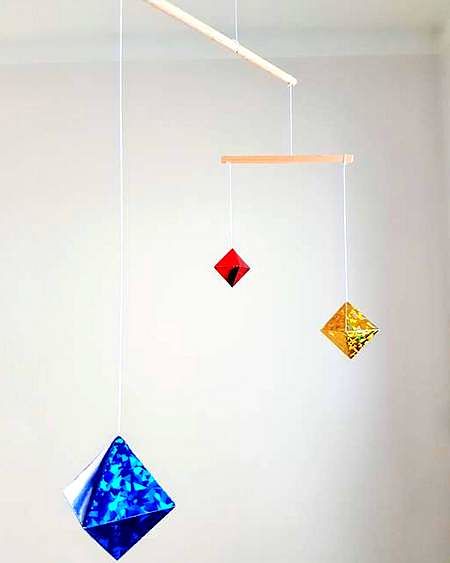 Giostrina degli ottaedri mobili per neonati di 5-6 settimane