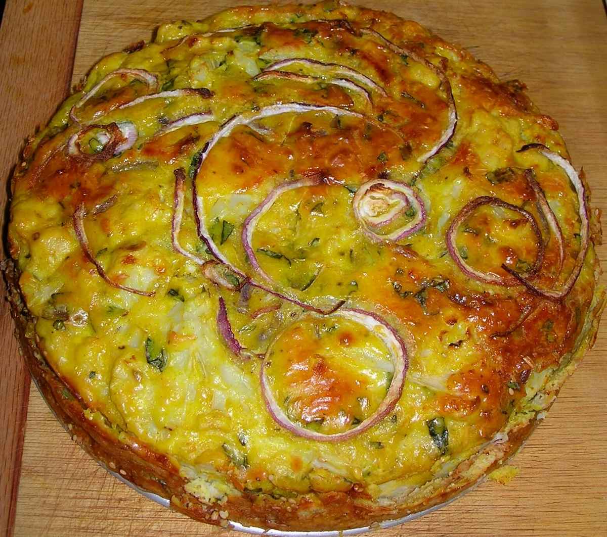 Tortino di cavolfiore e parmigiano Aspetto della torta di cavolfiore e parmigiano cotta al forno