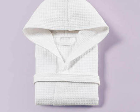 Accappatoio bianco a nido d'ape piegato