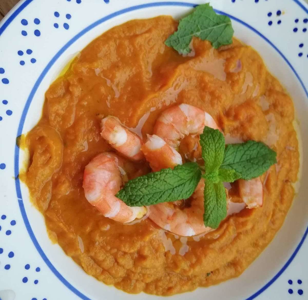 Crema di zucca con mazzancolle nel piatto