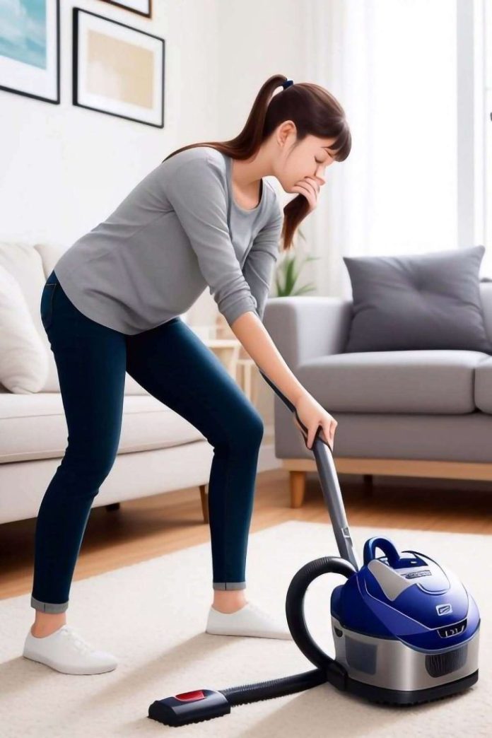 Giovane donna usa aspirapolvere che puzza